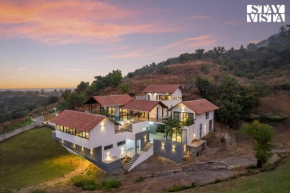 StayVista at Ekan with Sea views, Pool, WiFi